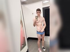 Shy boy wanks in a dressing room gay porn