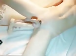 Slim oiled twink puts a giant dildo up his ass