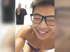 Straight Chinese bodybuilder with glasses posses wanks and cums for girl
