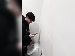 Straight lad at urinal