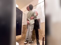 Stud fucks twink Sam in restroom