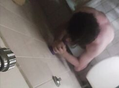 SUCKING A DILDO