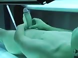 Teen wanking in a tanning boot