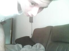 Twink has a wank on his couch
