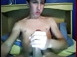 Twink porn jacks a load in his bed before sleeping