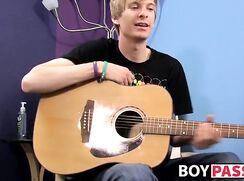 Twink with guitar
