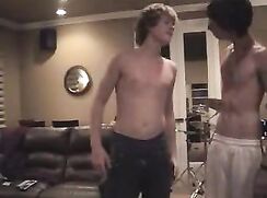 Two boys dancing to 'Summer Loving'