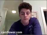 young guy cums on a towel