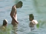 young nudists at the lake
